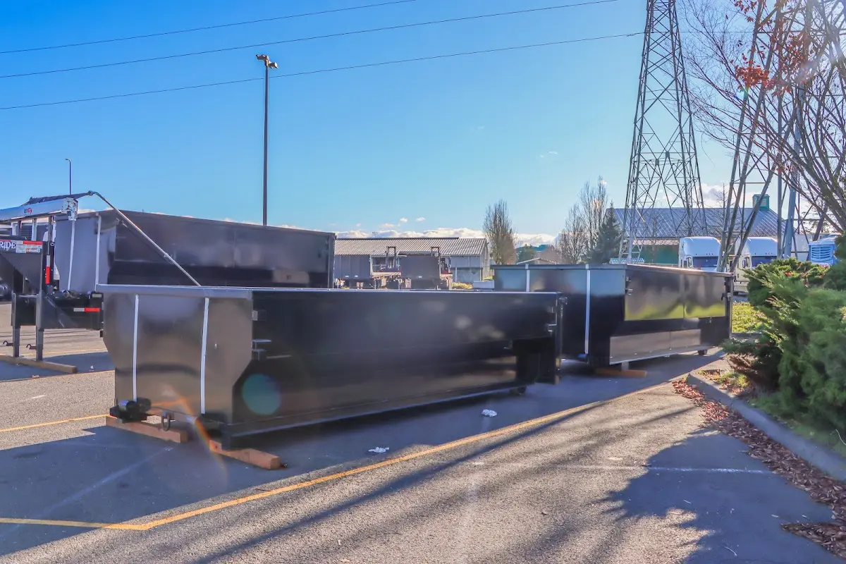 Roll-off dumpster ready for waste disposal at job site for Estate Cleanout Dumpster Rental in Rochelle Park